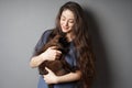 Happy young woman with her pet cat Royalty Free Stock Photo