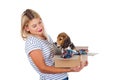 Woman holding beagle puppy in a box Royalty Free Stock Photo