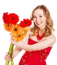 Happy young woman holding flowers. Royalty Free Stock Photo