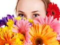 Happy young woman holding flowers. Royalty Free Stock Photo