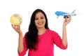 Happy young woman holding globe and toy plane Royalty Free Stock Photo