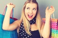 Happy young woman holding many shopping bags Royalty Free Stock Photo