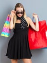 Happy young woman holding many shopping bags Royalty Free Stock Photo