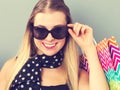 Happy young woman holding many shopping bags Royalty Free Stock Photo