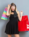 Happy young woman holding many shopping bags Royalty Free Stock Photo