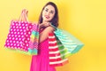 Happy young woman holding many shopping bags Royalty Free Stock Photo