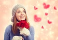 Happy young woman holding red roses Royalty Free Stock Photo