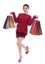 Happy young woman holding shopping bag isolated on white background Royalty Free Stock Photo