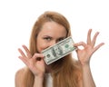 Happy young woman holding up cash money of one hundred dollars i Royalty Free Stock Photo