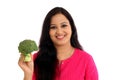 Happy young woman holdong broccoli Royalty Free Stock Photo