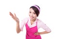 Happy young woman housewife showing Royalty Free Stock Photo