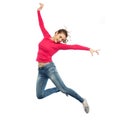 Happy young woman jumping in air or dancing Royalty Free Stock Photo