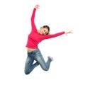 Happy young woman jumping in air or dancing Royalty Free Stock Photo