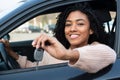 Happy young woman learning to drive car Royalty Free Stock Photo