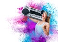 Happy young woman listening music with boombox