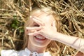 Happy young woman lying on cereal field Royalty Free Stock Photo