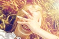 Happy young woman lying on cereal field Royalty Free Stock Photo