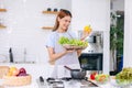 Happy Young Woman Making Salad. People Eating Healthy Food. Vegan Lady In Kitchen Home. Eat Vegetable For Dieting. Prepare Diet Royalty Free Stock Photo