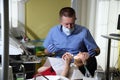 Happy young woman and male dentist after treatment in clinic.