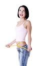 Happy young woman measuring her waist Royalty Free Stock Photo