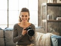 Happy young woman with modern dslr photo camera Royalty Free Stock Photo