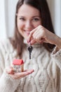 Happy young woman moving into a new home Royalty Free Stock Photo