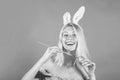 Happy young woman painting eggs. Happy people. Smile easter. Beautiful sensual blonde. Stunning beautiful young girl in