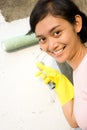 Happy young woman and painting job Royalty Free Stock Photo