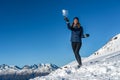 Happy young woman playing snowball fight on the snow day Royalty Free Stock Photo