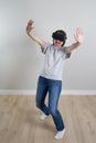 Happy young woman playing on VR glasses indoor, Virtual reality concept with young girl having fun with headset goggles Royalty Free Stock Photo