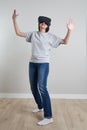 Happy young woman playing on VR glasses indoor, Virtual reality concept with young girl having fun with headset goggles Royalty Free Stock Photo