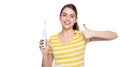 happy young woman point finger on electric toothbrush isolated on white background Royalty Free Stock Photo