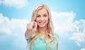 Happy young woman pointing finger to you Royalty Free Stock Photo