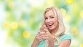 Happy young woman pointing finger to you Royalty Free Stock Photo