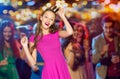 Happy young woman in princess crown at night club Royalty Free Stock Photo