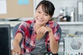 happy young woman repairing computer Royalty Free Stock Photo