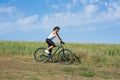 Happy Young Woman riding bicycle outside Royalty Free Stock Photo