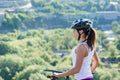 Happy Young Woman riding bicycle outside Royalty Free Stock Photo