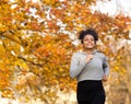 Happy young woman running outdoors in the park Royalty Free Stock Photo