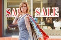 Happy young fashion woman with shopping bags Royalty Free Stock Photo