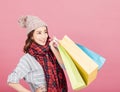 Happy young woman with shopping bags. Winter sale Royalty Free Stock Photo