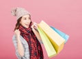 Happy young woman with shopping bags. Winter sale Royalty Free Stock Photo