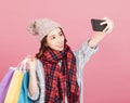 Happy young woman with shopping bags. Winter sale Royalty Free Stock Photo