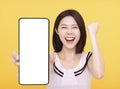 Happy Young woman  showing blank screen Smart phone In Her Hand Royalty Free Stock Photo