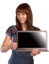 Happy young woman showing laptop screen Royalty Free Stock Photo