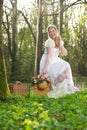 Happy young woman sitting on a swing outdors Royalty Free Stock Photo