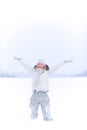 Happy young woman in snow