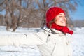 Happy young woman on the snow sunny day Royalty Free Stock Photo