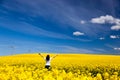 Happy young woman on spring field, ecology Royalty Free Stock Photo