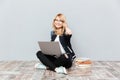 Happy young woman student using laptop computer. Royalty Free Stock Photo